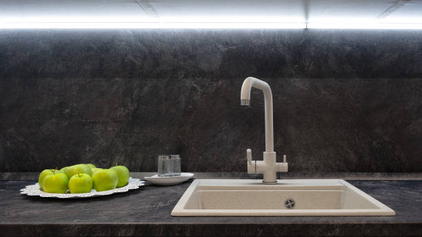 istock Gray kitchen interior with mixer and apples on a platter 1355148800