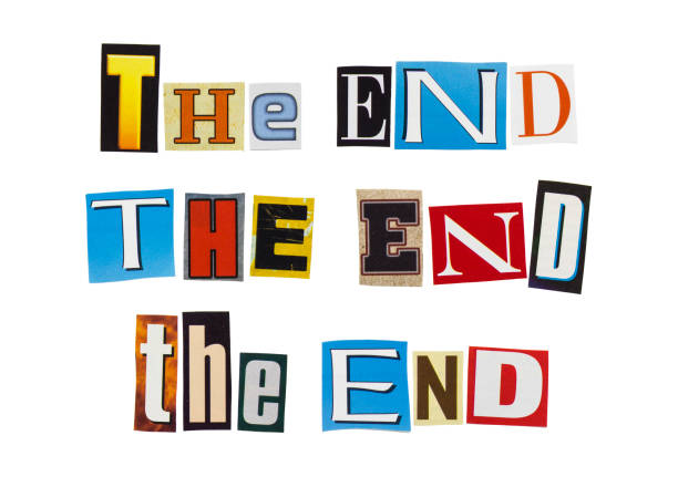 THE END - phrase from cutting magazine clippings isolated on white background. Ending and finishing concept. stock photo
