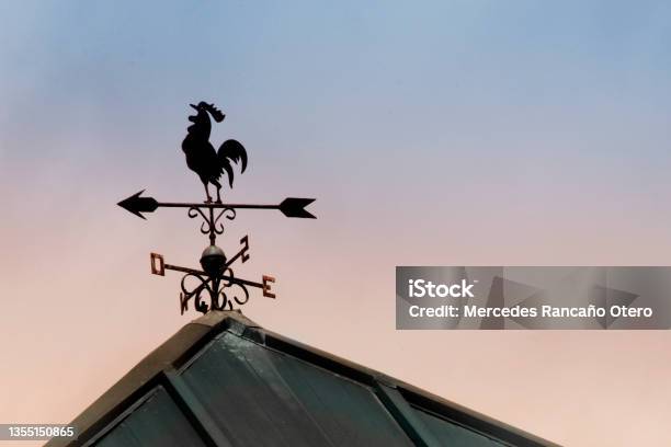 Weathervane In Rooster Shape Sunset Background Stock Photo - Download Image Now - Weather Vane, Meteorology, Outline