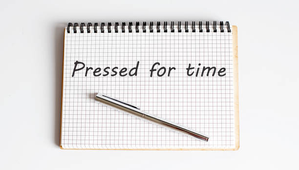 istock PRESSED FOR TIME - the text is written on the Notepad with pen 1355155975