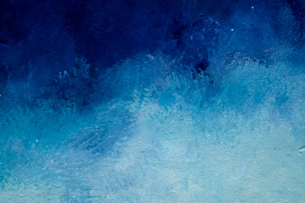 istock Abstract blue and white painted wall texture background outdoors 1355156147