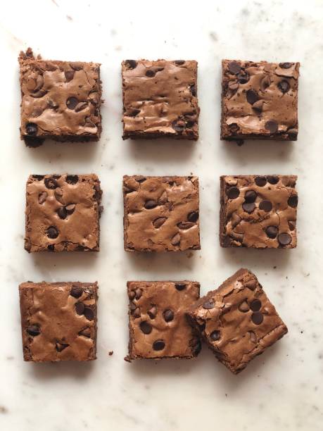 istock Rows of freshly baked brownies 1355161447