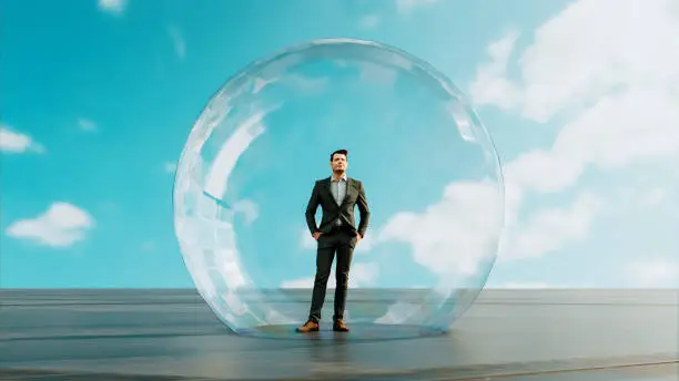 Digitally generated concept image of man inside a big bubble. It could be isolation for health reasons, but it could also be, that the man is inside a financial bubble.