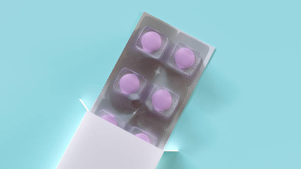 scatola con pillole in blister - pill purple capsule vitamin pill foto e immagini stock