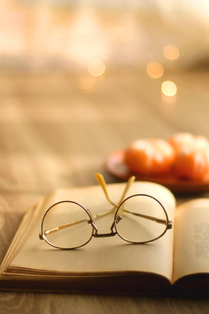 istock Book, Glasses and Tangerines 1355164960