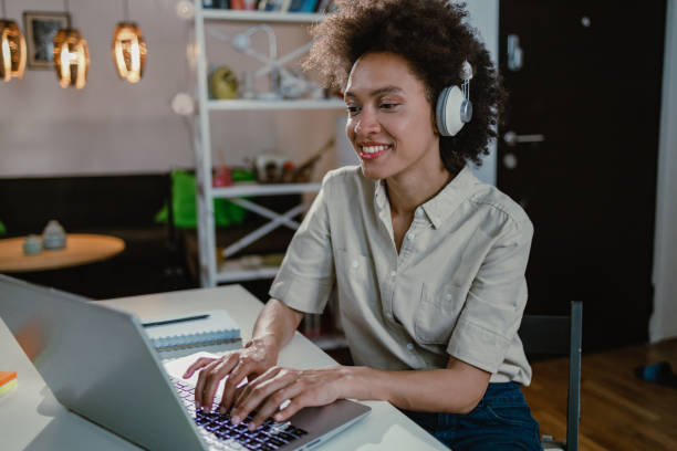 istock Woman works at home on laptop 1355166971