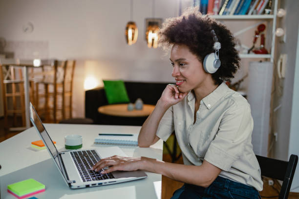 istock Woman works at home on laptop 1355167206