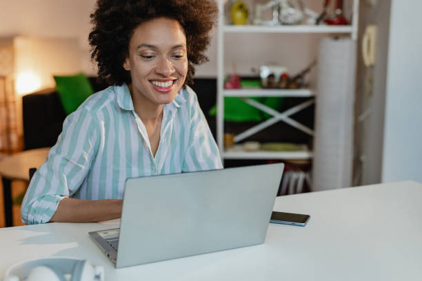 istock Woman working on laptop at home 1355167293
