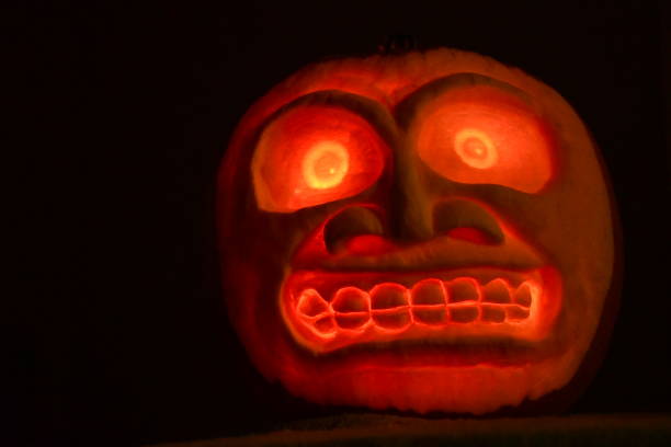 istock Candle Lit 3D Sculpted Pumpkin 1355172104