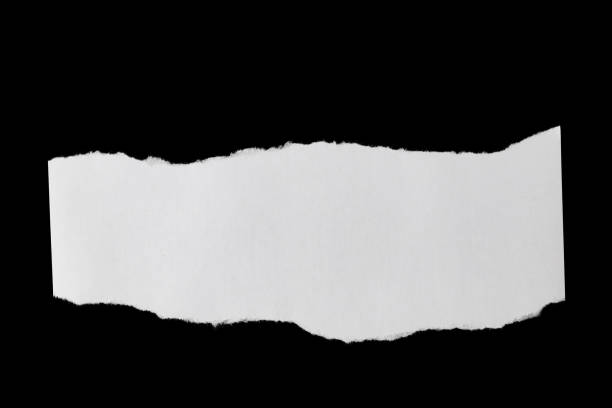 istock white paper sheets with ragged edges isolated on a black background 1355175963
