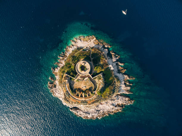 Aerial view of round fortress Mamula on the island. Montenegro Aerial view of round fortress Mamula on the island. Montenegro. High quality photo kotor montenegro stock pictures, royalty-free photos & images