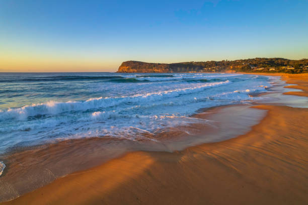 istock Surfs up aerial sunrise seascape 1355183709