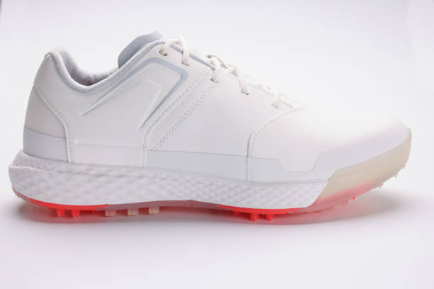 istock Stylish white sport shoe with bright neon sole model for running 1355189165