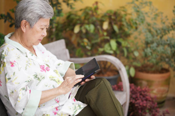 istock asian old elder senior woman elderly using mobile smart phone . mature retirement lifestyle 1355189304