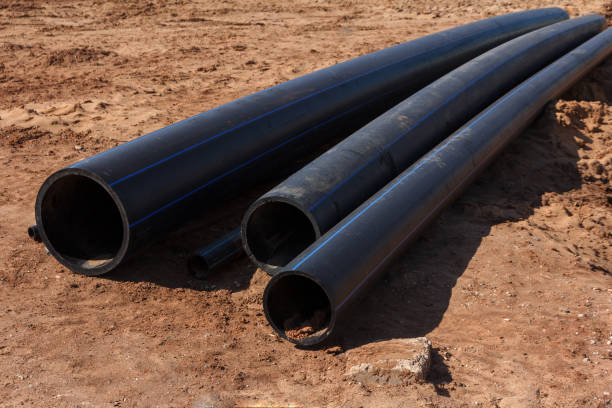 istock Plastic pipes for water supply system. New plastic pipes. Materials for the construction of water supply 1355193374