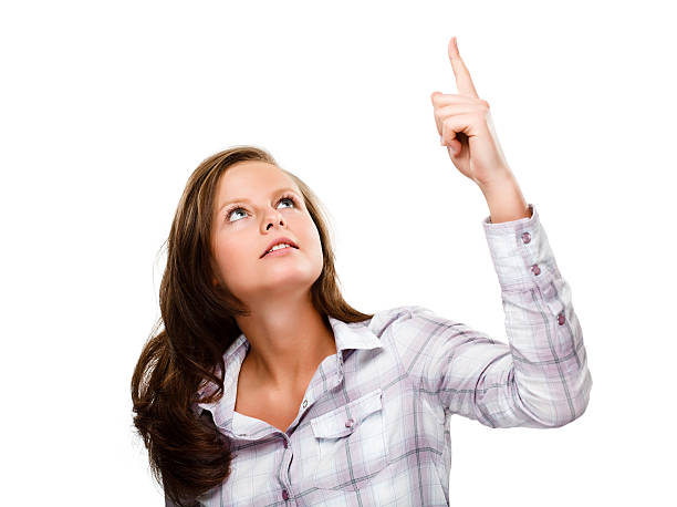 istock Woman pointing isolated on white background 135519467