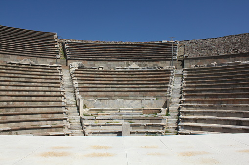 Izmir, Turkey-September 13, 2014: Ruins of the Asklepion Healing Temple in Pergamon. A small amphitheater.