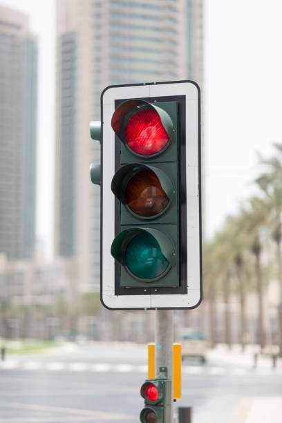 istock Red traffic stoplight in the city. 1355195058