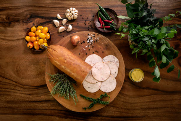 istock smoked chicken ham on rustic wood table with natural ingredients arrangement 1355195467