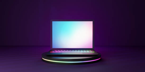 istock 3D rendering illustration. Laptop computer with blank screen and colorful keyboard place on the black cylinder in the darkroom and purple lighting. Image for presentation. 1355196340