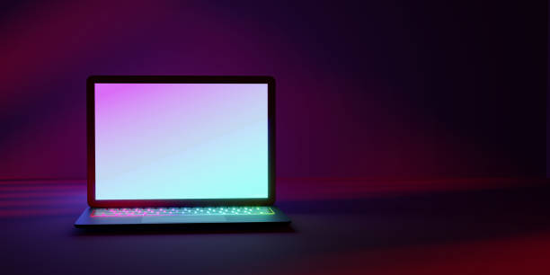 istock 3D rendering illustration. Laptop computer with colorful screen and keyboard place in the darkroom and red blue lighting. Image for presentation. 1355196343