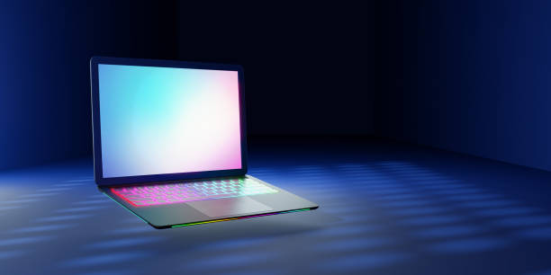 istock 3D rendering illustration. Laptop computer with blank screen and colorful keyboard place in the darkroom and blue lighting effect. Image for presentation. 1355196351