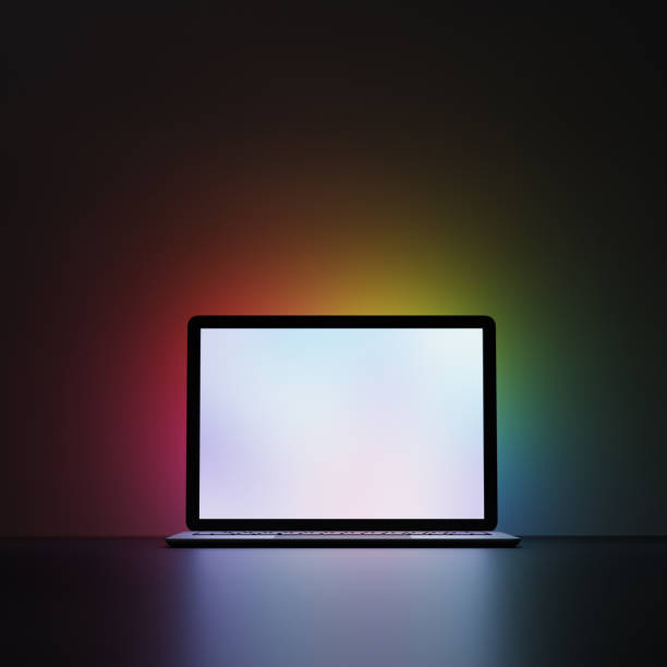 istock Laptop with white blank screen on dark background and multicolor lighting. Rainbow lighting background. 3D illustration rendering image. 1355196395