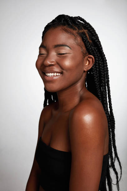 istock Studio shot of an attractive young woman posing against a grey background 1355200044