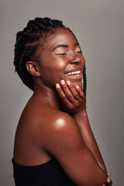 istock Studio shot of an attractive young woman posing against a grey background 1355200053