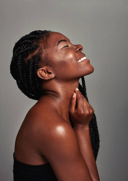 istock Studio shot of an attractive young woman posing against a grey background 1355200375