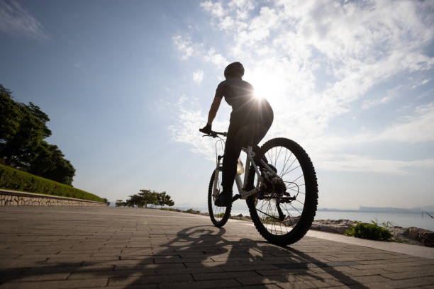 istock Riding bike on the coast path 1355201309