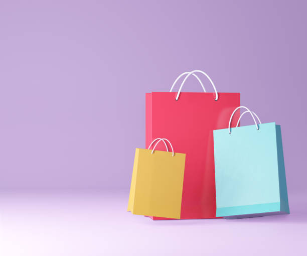 istock 3D color paper shopping bag on purple background. 3D illustration rendering. 1355201440