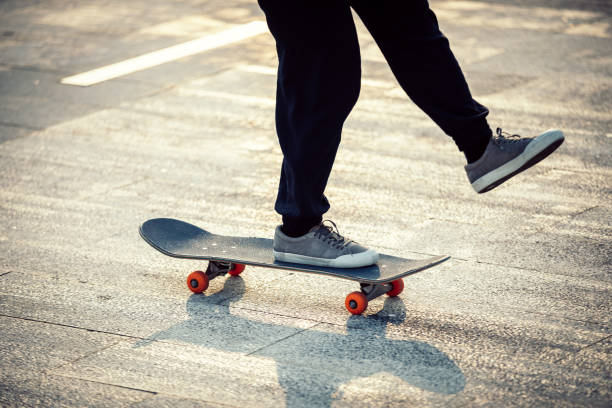 istock Skateboarder skateboarding outdoors in city 1355203361