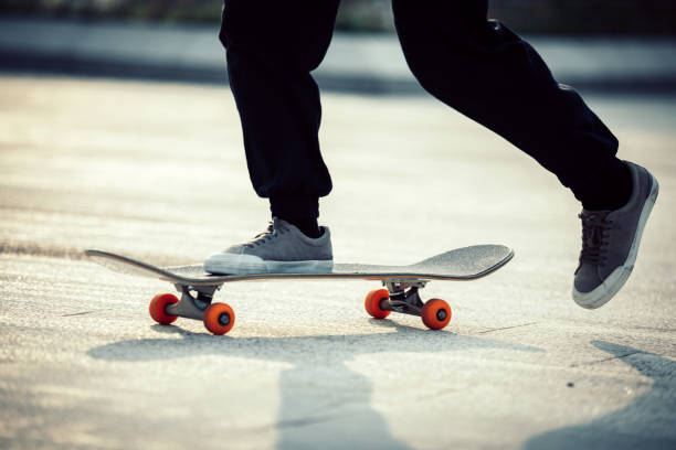 istock Skateboarder skateboarding outdoors in city 1355203393