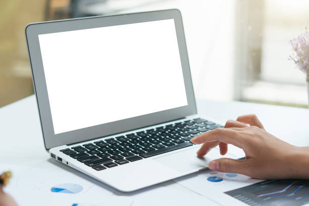 istock Blank screen laptop mock up,Woman typing laptop keyboard. 1355206141