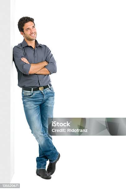 Thinking Young Man Full Length Stock Photo - Download Image Now - Men, Leaning, White Background