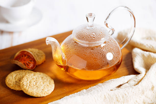 istock hot glass teapot with teabag . 1355206853