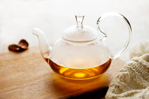 istock hot glass teapot with teabag. 1355206854
