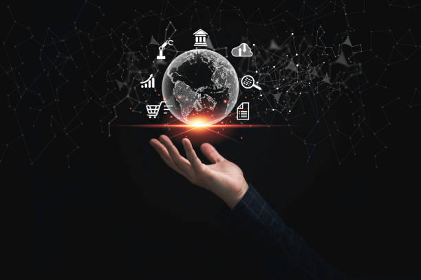 istock Businessman using smartphone with virtual world and business icons for digital technology transformation concept. 1355212044