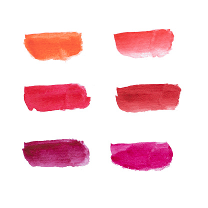 watercolor brush strokes on white background in red magenta color scheme