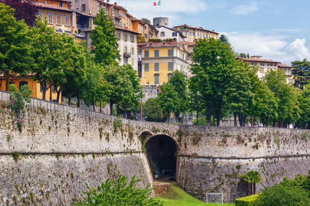 View of the famous Venetian walls in Bergamo (Citta Alta) in northern Italy. Bergamo is a city in the alpine Lombardy region. View of the famous Venetian walls in Bergamo (Citta Alta) in northern Italy. Bergamo is a city in the alpine Lombardy region. bergamo stock pictures, royalty-free photos & images