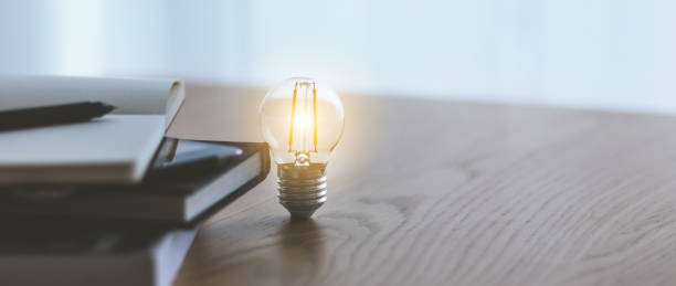 istock Bright lamp. Business working success or education learning idea 1355213809