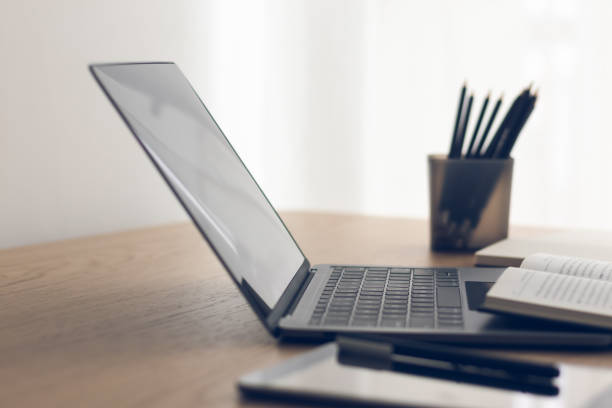 istock Laptop with book. Business success learning or education idea concept 1355213828