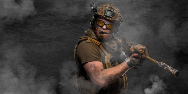 istock A special forces soldier during a special operation in smoke against a dark concrete wall 1355215648