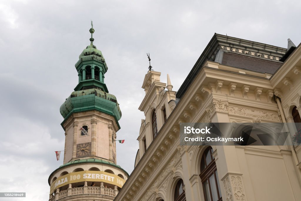 Tower in Sopron, Hungary Picture of religious building tower against cloudy sky in Sopron, Hungary Architectural Feature Stock Photo