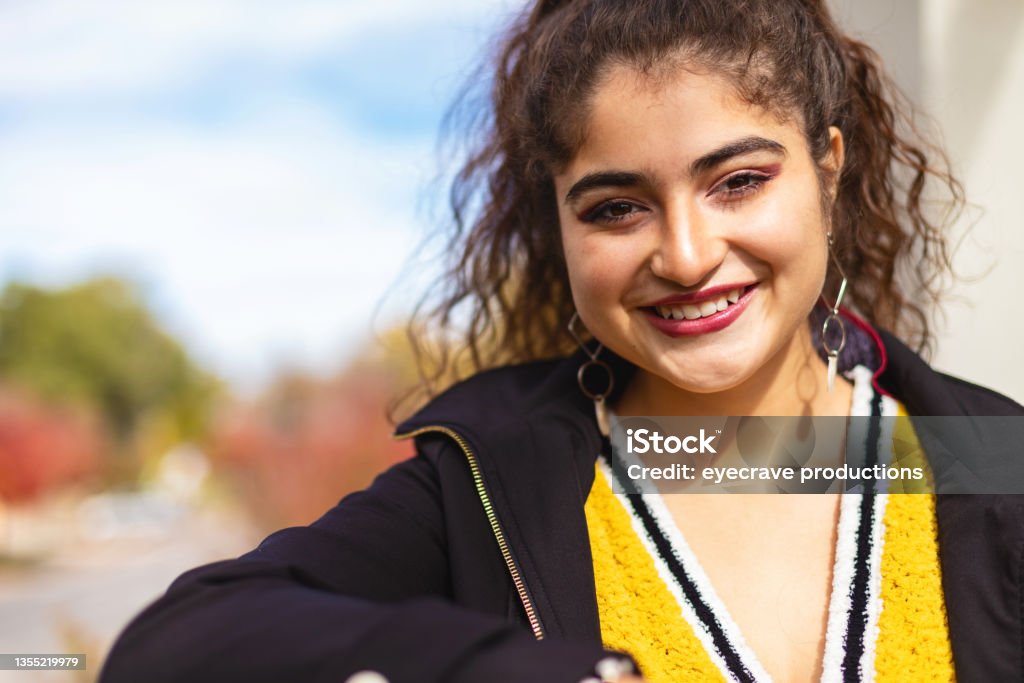 Generation Z Female of Mexican American Ethnicity on High Rise Balcony Afro-Latinx lifestyle Photo Series In Western Colorado Generation Z Female of Mexican American Ethnicity on High Rise Balcony Photo Series Matching 4K Video Available (Shot with Canon 5DS 50.6mp photos professionally retouched - Lightroom / Photoshop - original size 5792 x 8688 downsampled as needed for clarity and select focus used for dramatic effect) 18-19 Years Stock Photo