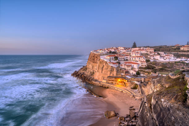 Azenhas do Mar at the portuguese Atlantic coast Azenhas do Mar at the portuguese Atlantic coast just after sunset azenhas do mar stock pictures, royalty-free photos & images