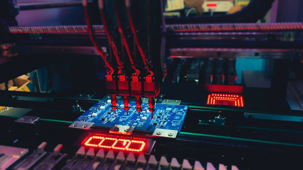 istock Production of modern computer chips on SMT machine 1355223442
