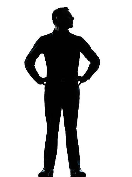 istock one business man standing hands on hips silhouette 135522618