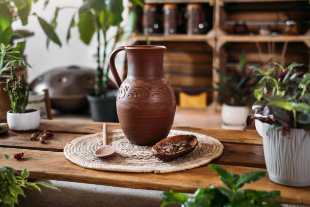 istock Jug with hot organic cacao for ceremony. Healthy drink 1355230593